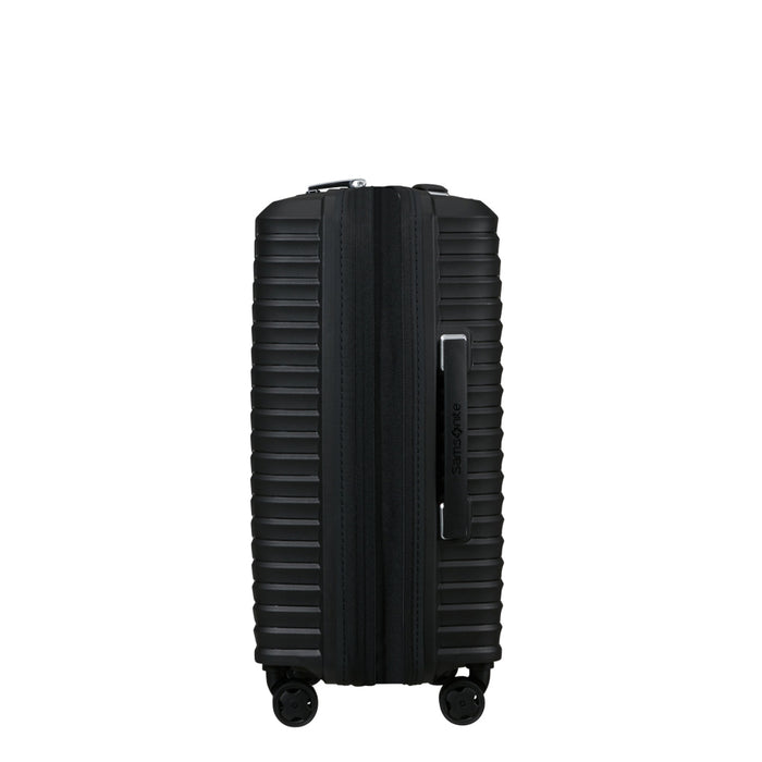 Black Samsonite Upscape slim carry-on spinner suitcase with four wheels and a retractable handle.