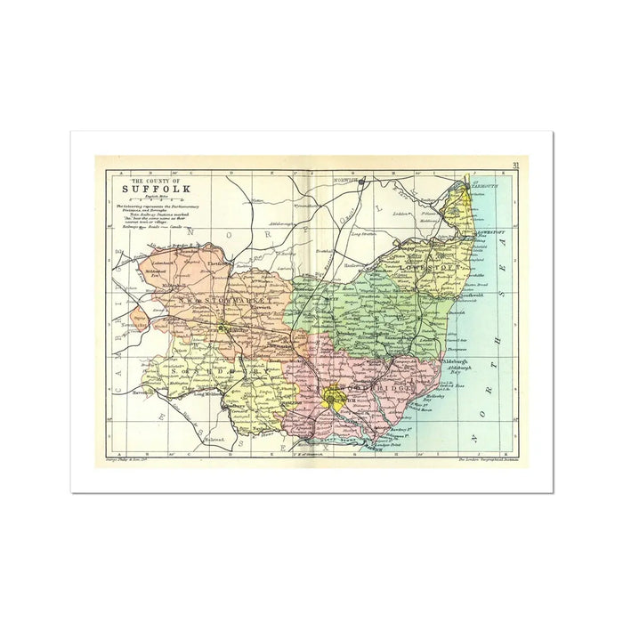 A vintage Suffolk map print depicting the county of Suffolk with various shades of colours differentiating the regions.