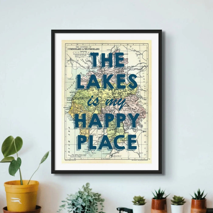 Lake District map print, framed on wall in living room with the text 'The Lakes is my Happy Place' overlayed on a map of the Lake District.