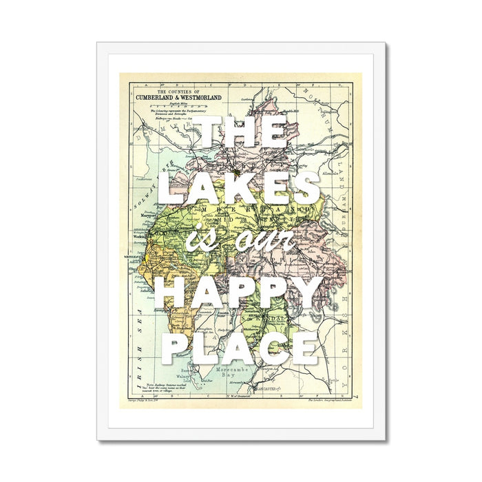 A framed Lake District map print with the text 'The Lakes is our Happy Place' overlaid on it.