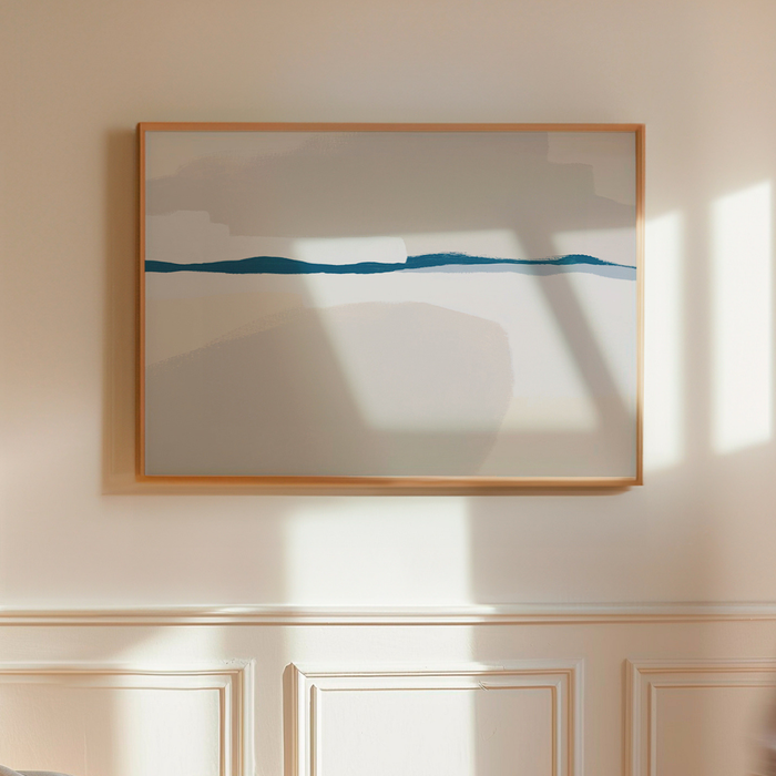 Framed abstract artwork on a wall with sunlight casting shadows