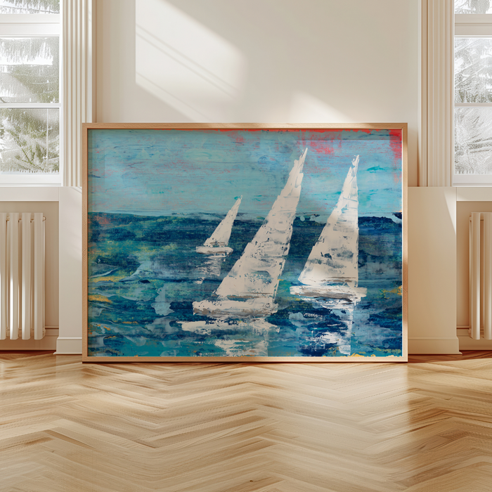 Abstract painting of sailboats on a blue background in a room with wooden floor and large windows.