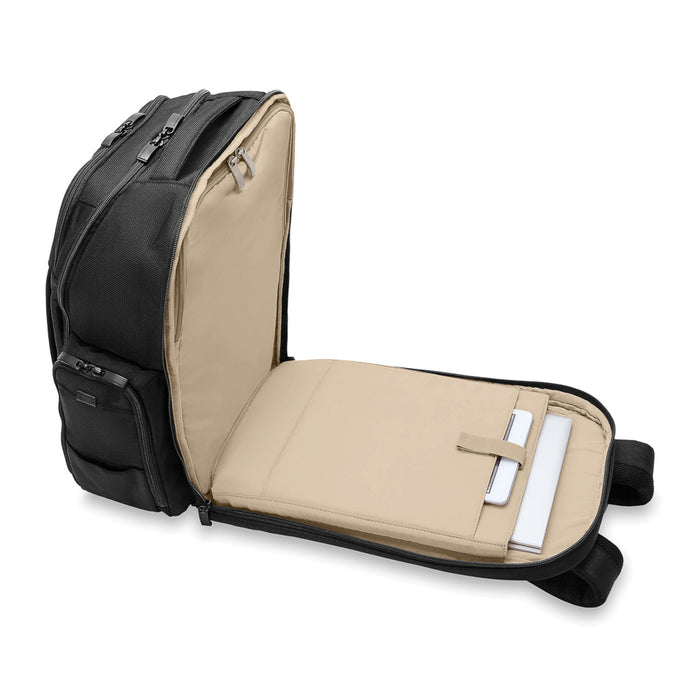 Briggs & Riley Luggage Baseline 2 travel backpack in black with multiple compartments and ergonomic design.