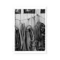 Black and white photograph of ropes hanging on a vintage boat