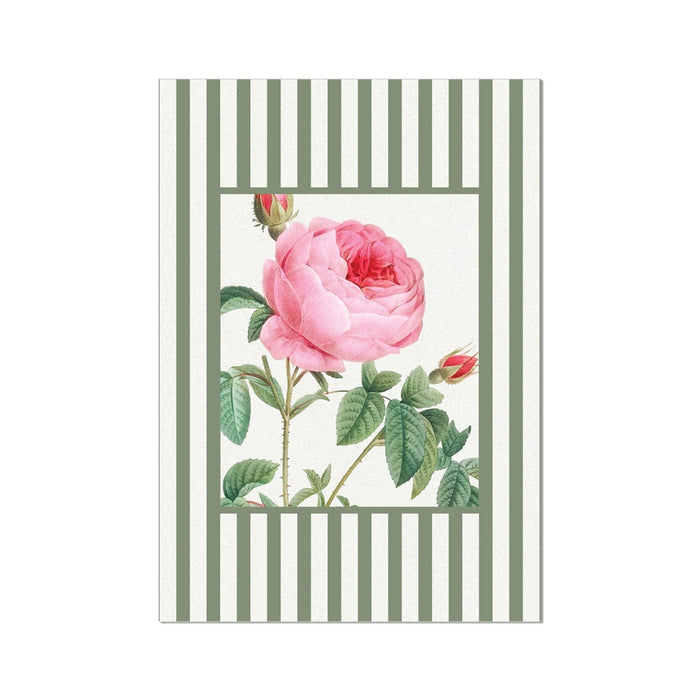 Art print with a pink rose design on a striped background