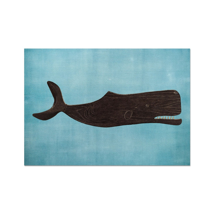 Vintage whale art print on textured blue background