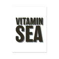 A black and white typography art print with the words 'VITAMIN SEA' in bold letters, presented on a white background.