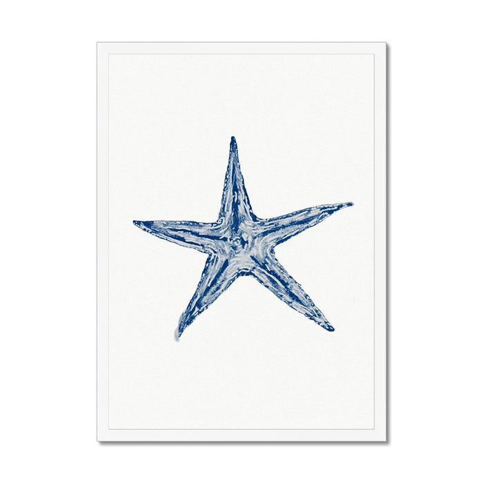 Framed watercolour art print of a blue starfish on a white background, housed in a simple white frame