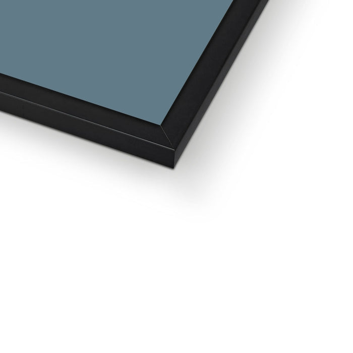 Close-up of a black frame corner with a blue background