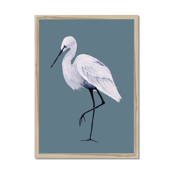 Framed artwork of a white bird on a blue background